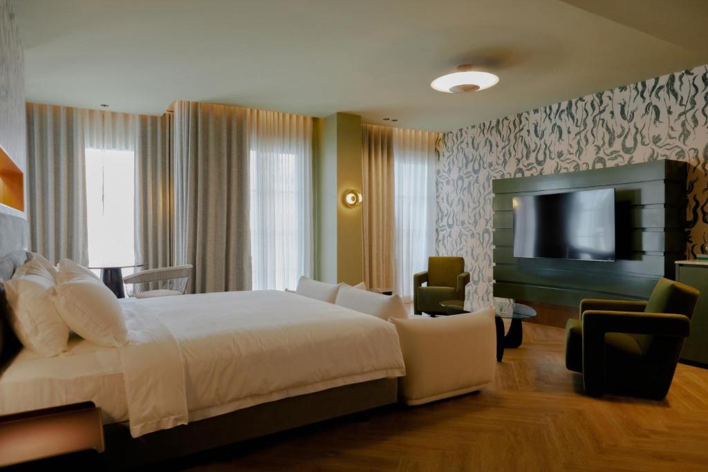 Postel nebo postele na pokoji v ubytování Hotel Sapin