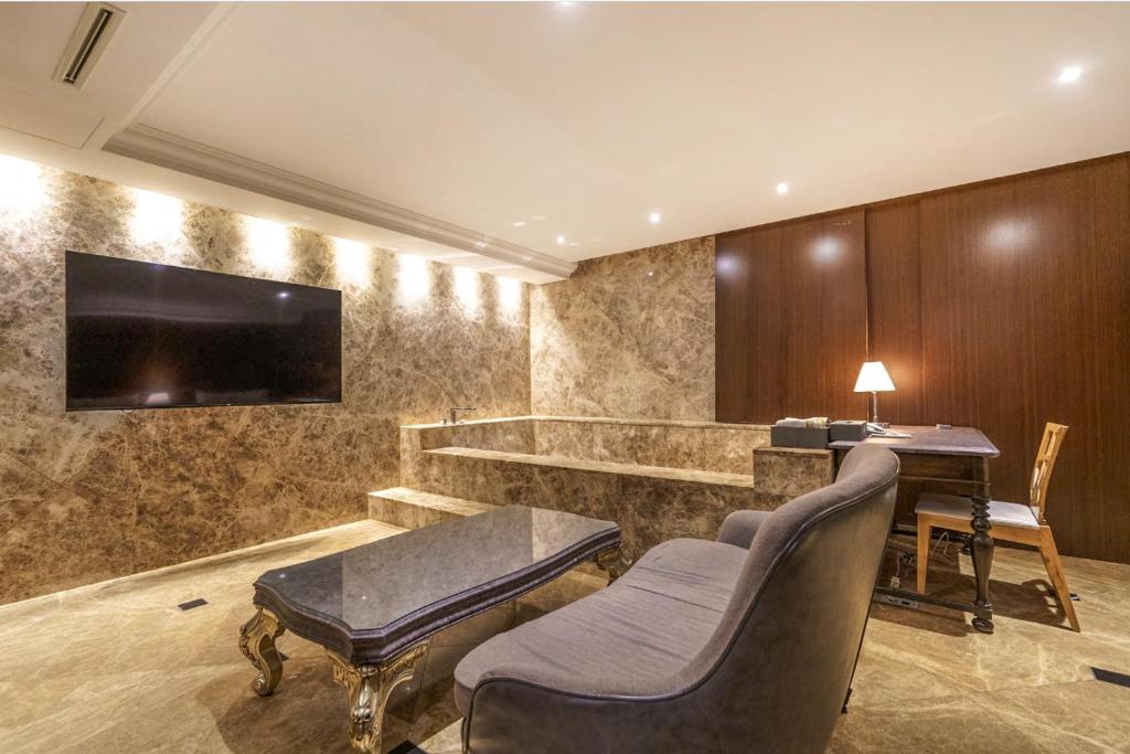 TV a/nebo společenská místnost v ubytování Hotel Cullinan Wangsimni