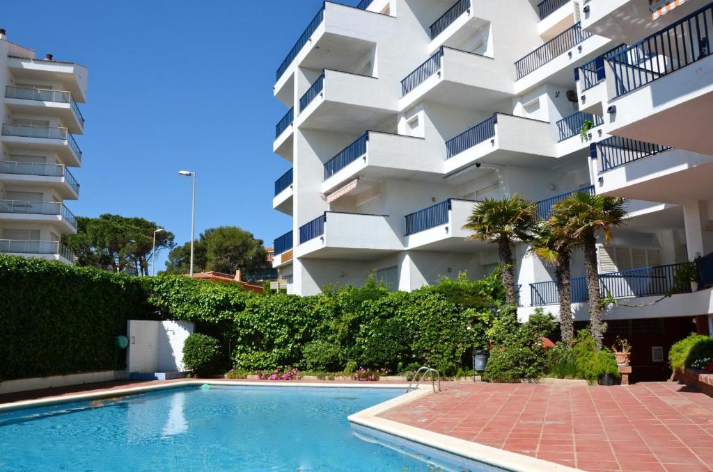 Bazén v ubytovaní Passeig Del Mar - apartamentos primera linea alebo v jeho blízkosti