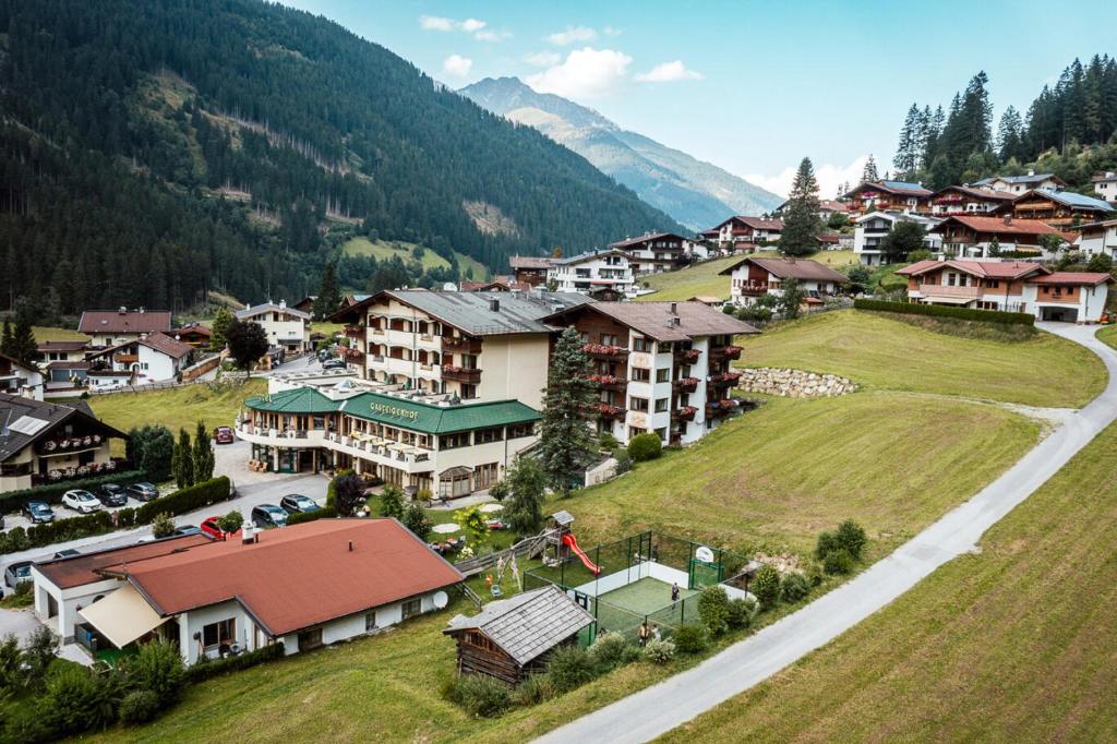 an aerial view of a village in the mountains at Alpenwellnesshotel Gasteigerhof in Neustift im Stubaital