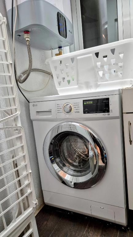 Kuchyňa alebo kuchynka v ubytovaní Apartmán pri mori
