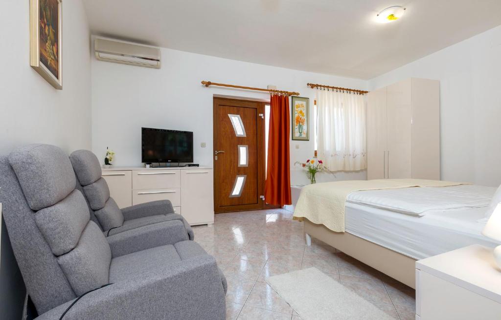 Postel nebo postele na pokoji v ubytování Studio Apartment Oliva