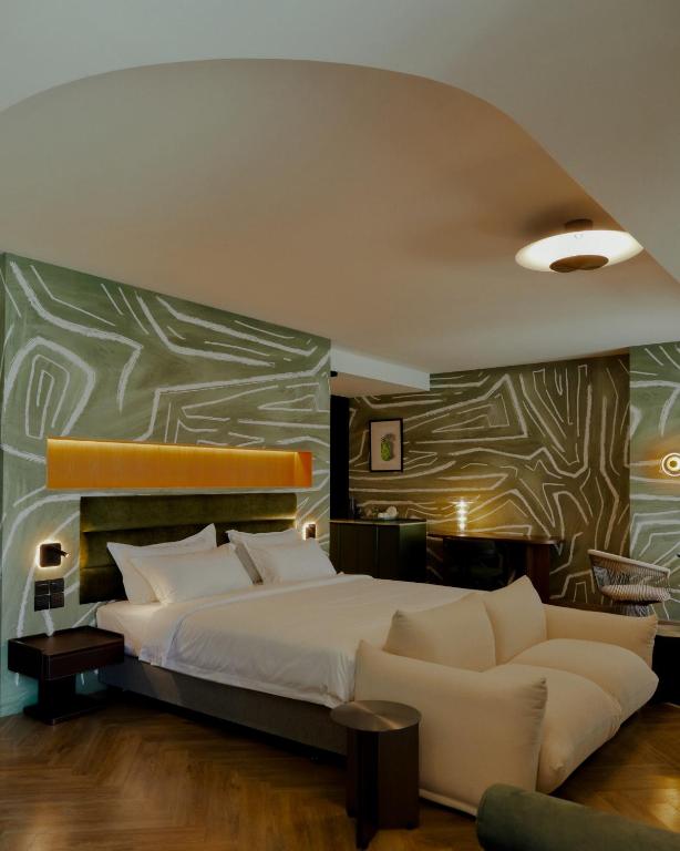 Postel nebo postele na pokoji v ubytování Hotel Sapin