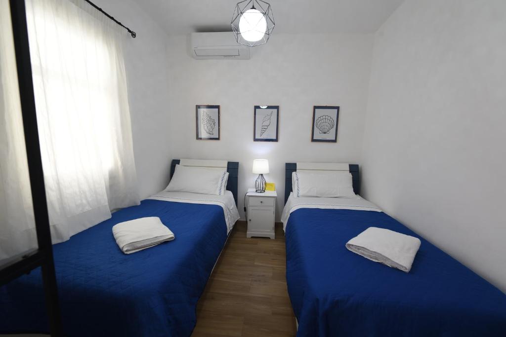 Posteľ alebo postele v izbe v ubytovaní Terra Sinus Beautiful Suite