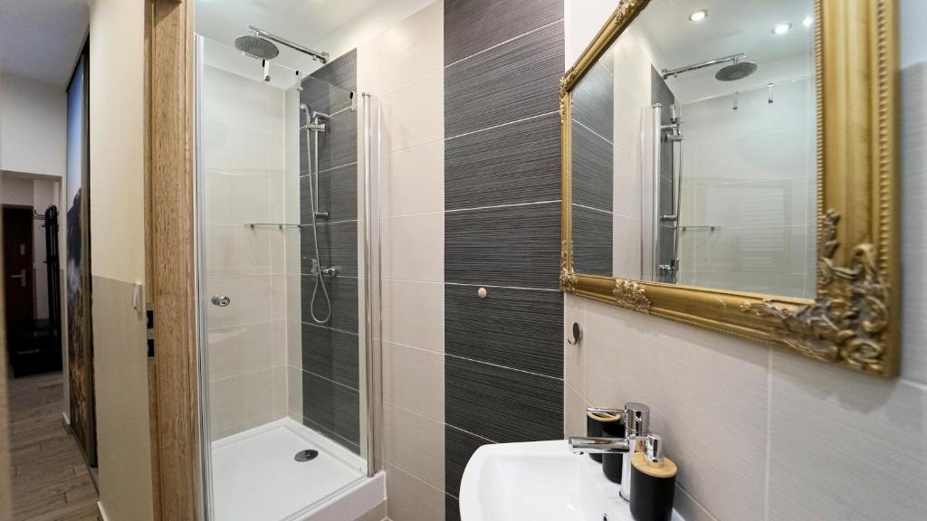 Kúpeľňa v ubytovaní Apartamenty EverySky - Karkonoska 30
