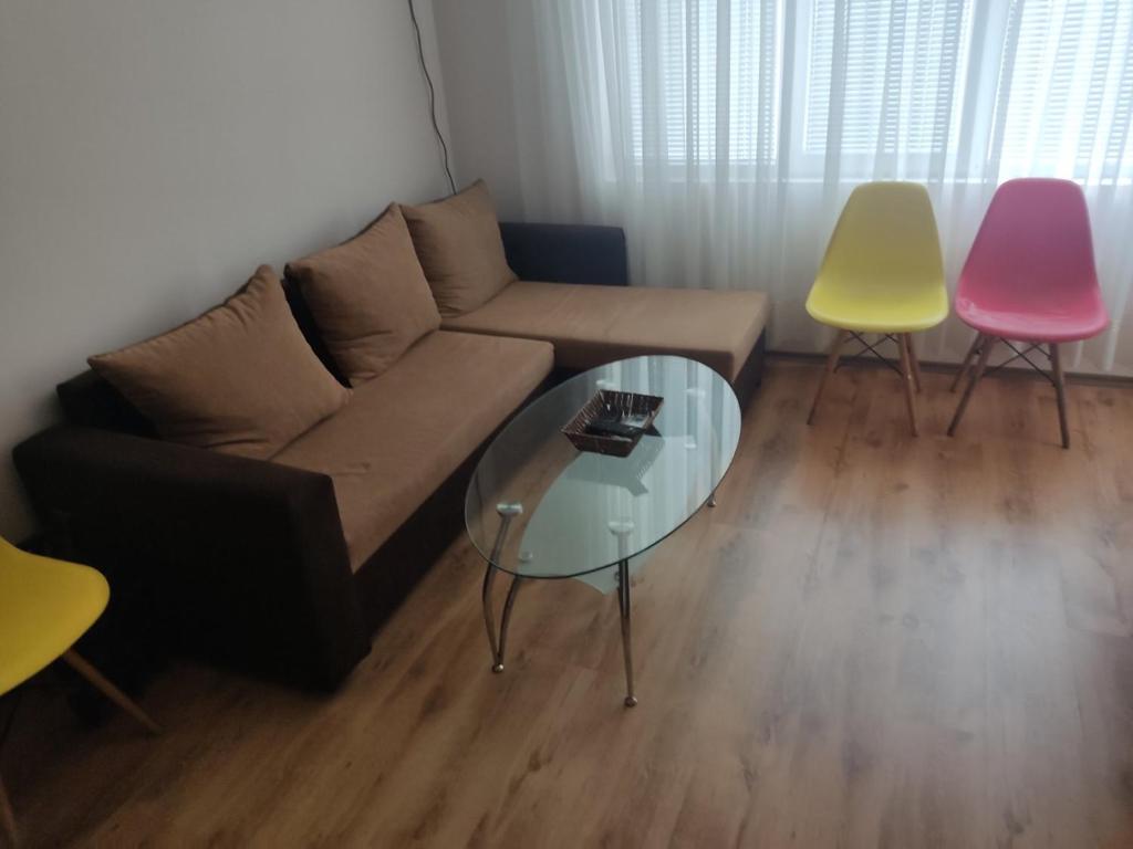 A seating area at apartment Radost