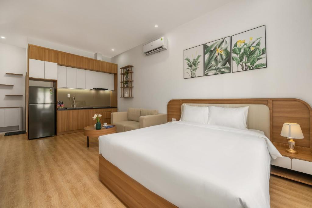 Postel nebo postele na pokoji v ubytování Delak Homestay