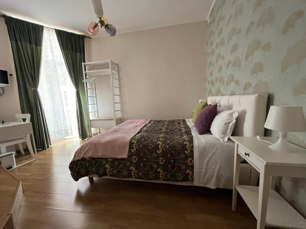 Posteľ alebo postele v izbe v ubytovaní Monti49 GuestHouse
