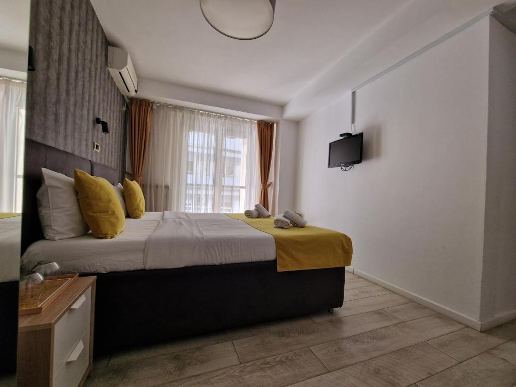 TV a/nebo společenská místnost v ubytování Garni House 46 Plus
