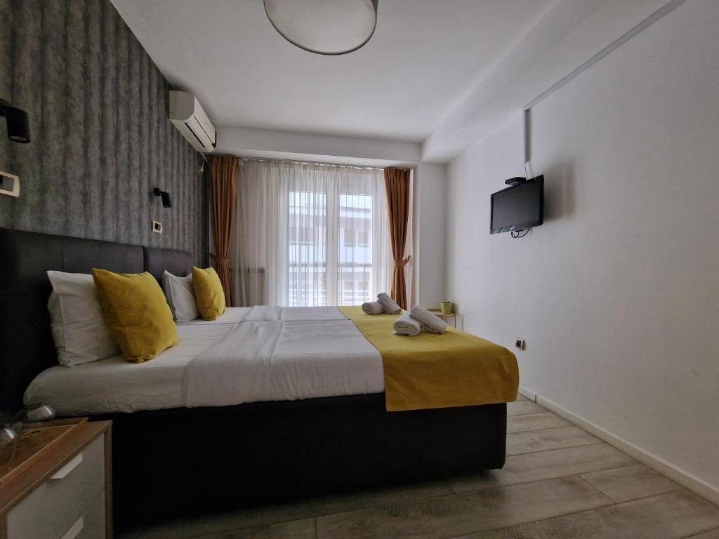 Postel nebo postele na pokoji v ubytování Garni House 46 Plus