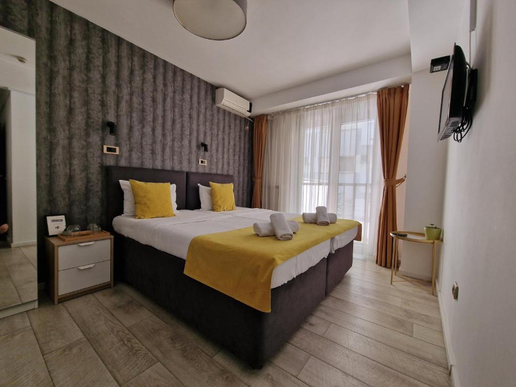 Postel nebo postele na pokoji v ubytování Garni House 46 Plus