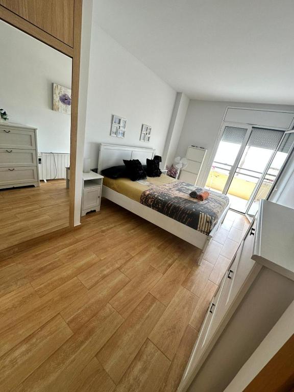 Posteľ alebo postele v izbe v ubytovaní Apartamento Primera Linea de Mar, Cunit