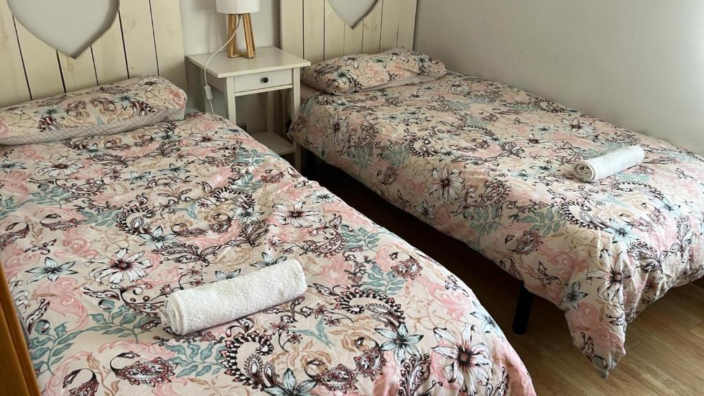 Posteľ alebo postele v izbe v ubytovaní Apartamento Primera Linea de Mar, Cunit