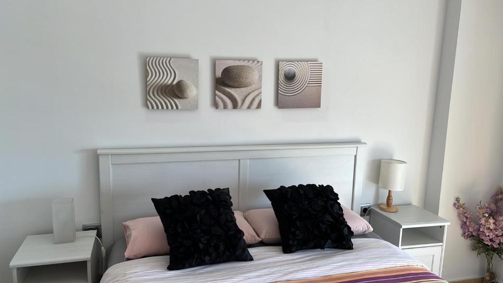 Posteľ alebo postele v izbe v ubytovaní Apartamento Primera Linea de Mar, Cunit