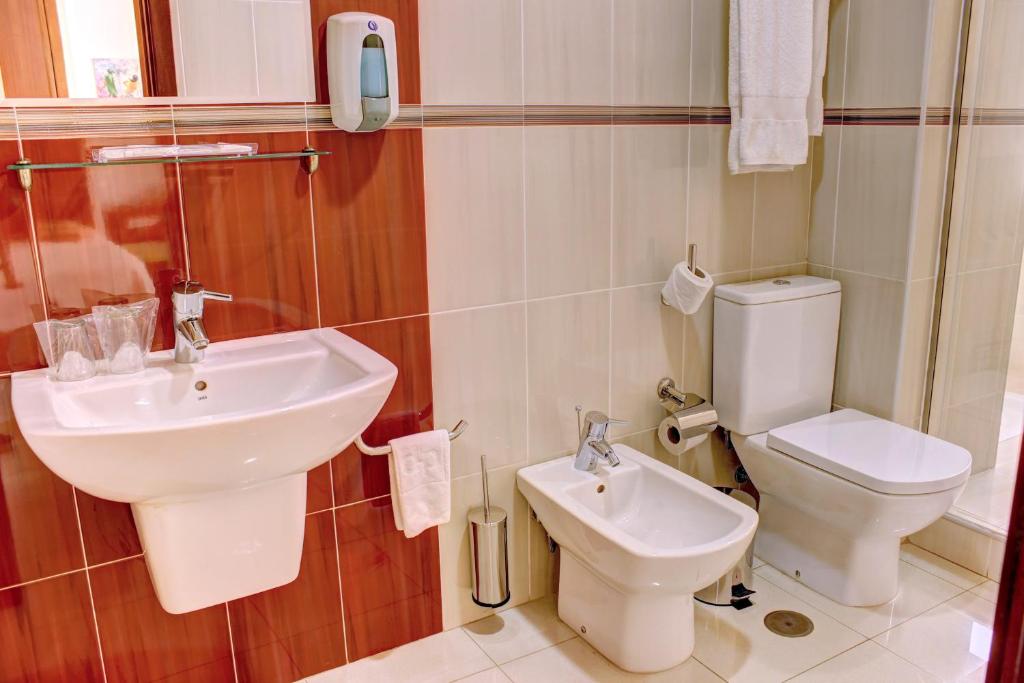 Koupelna v ubytování Hotel LIVVO Don Paco