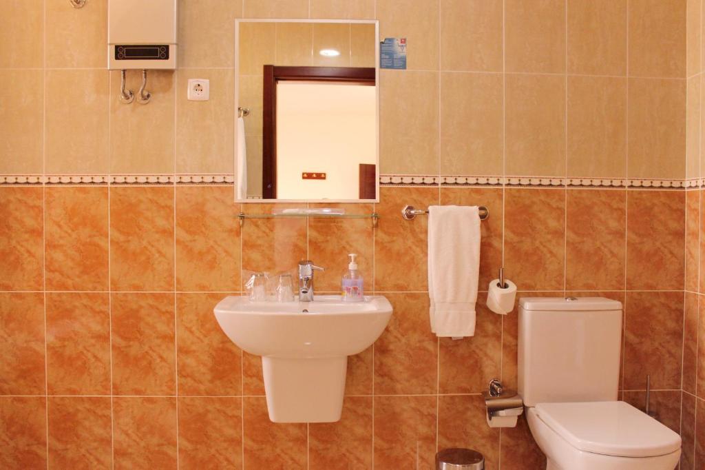 Koupelna v ubytování Hotel LIVVO Don Paco