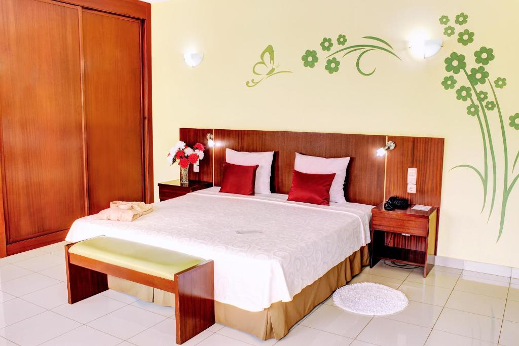 Postel nebo postele na pokoji v ubytování Hotel LIVVO Don Paco