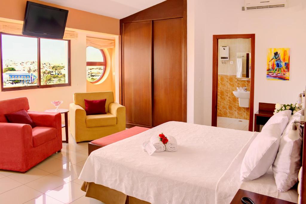 Postel nebo postele na pokoji v ubytování Hotel LIVVO Don Paco