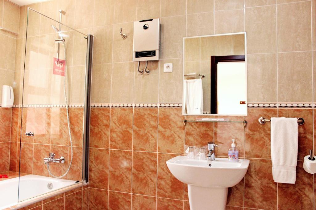 Koupelna v ubytování Hotel LIVVO Don Paco