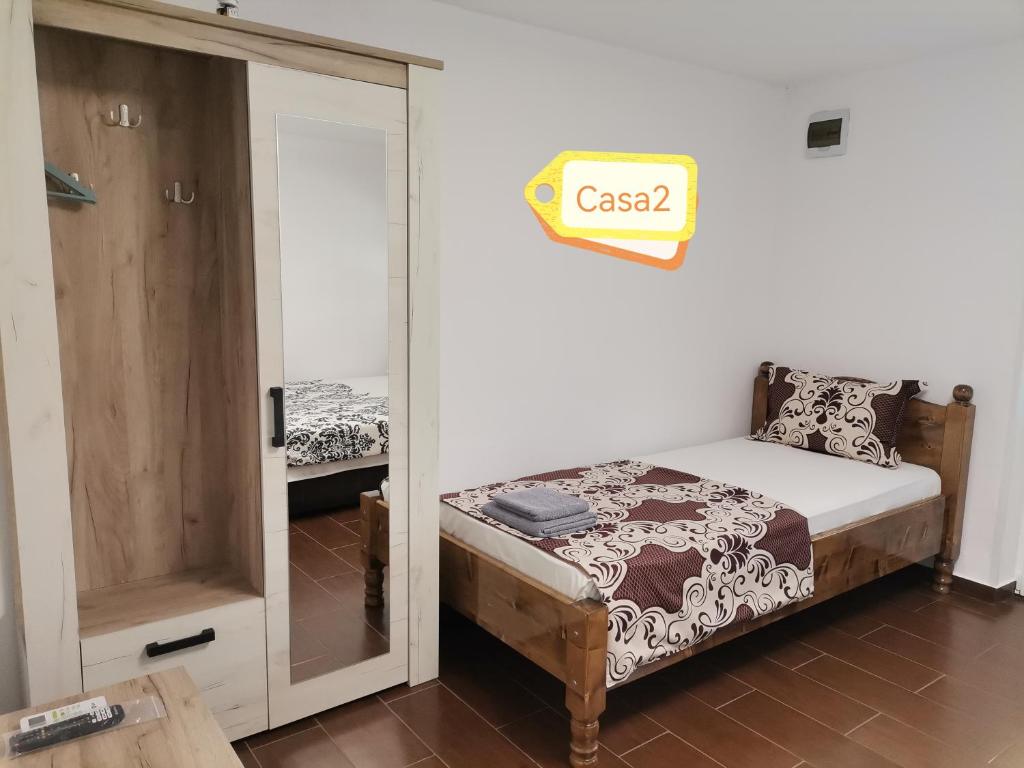 Postel nebo postele na pokoji v ubytování Casa Dașoveanu