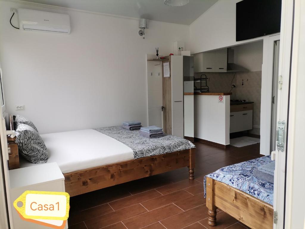 Postel nebo postele na pokoji v ubytování Casa Dașoveanu