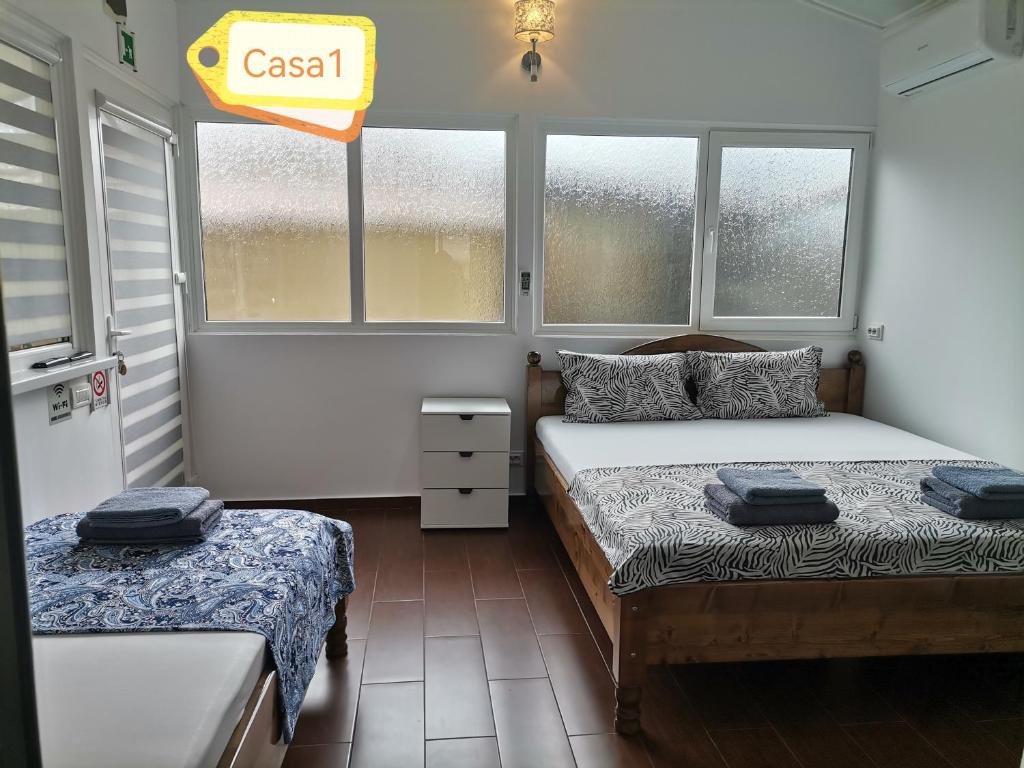 Postel nebo postele na pokoji v ubytování Casa Dașoveanu