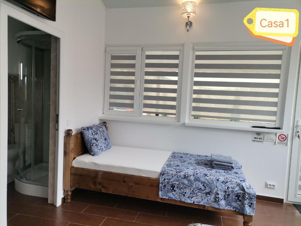Postel nebo postele na pokoji v ubytování Casa Dașoveanu