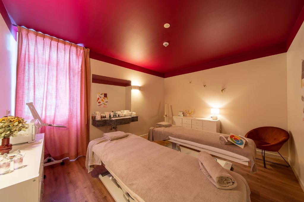 Postel nebo postele na pokoji v ubytování Koener Hotel & Spa