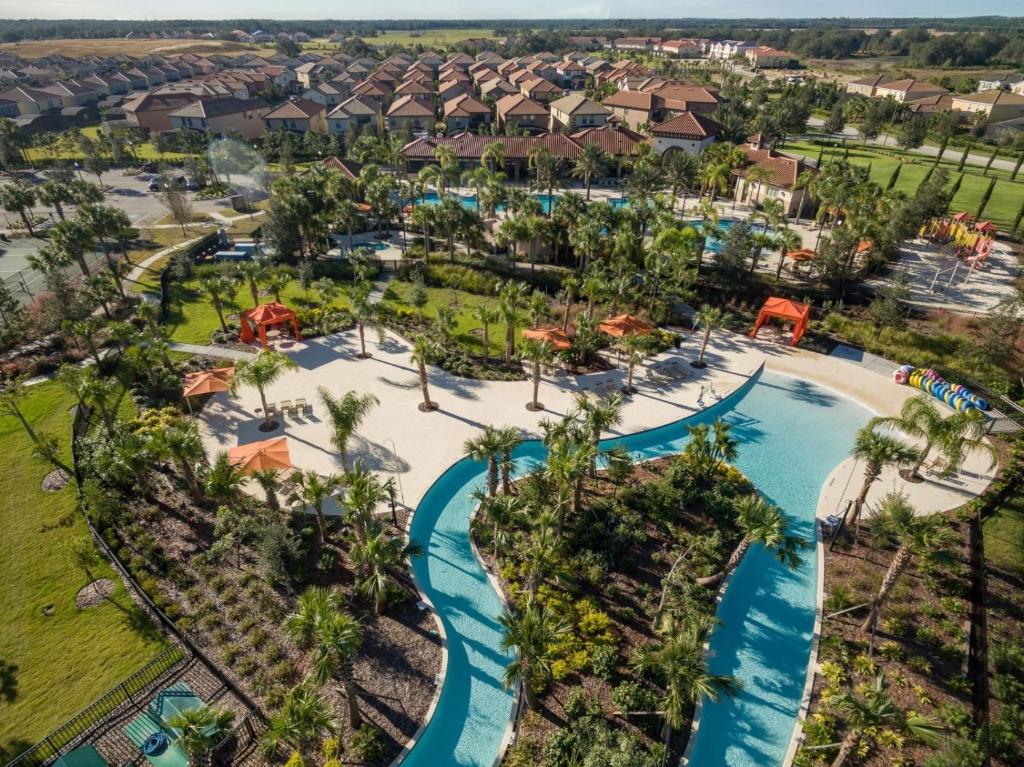 an aerial view of the pool at a resort at Solterra Resort Home - Waterslide and Lazy River in Davenport