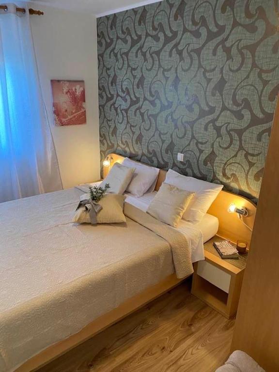 Кровать или кровати в номере Apartments Sestanka