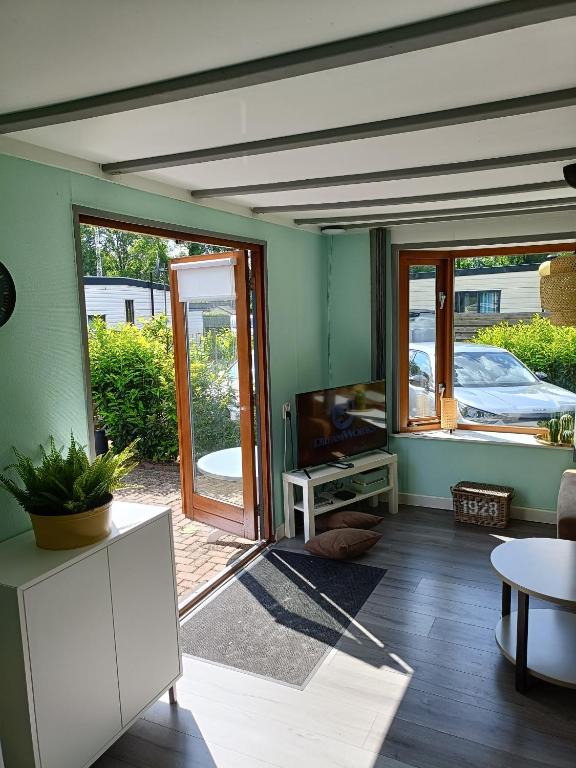 Posezení v ubytování Vakantiehuisje Veluwe, Alleen Voor Recreatie