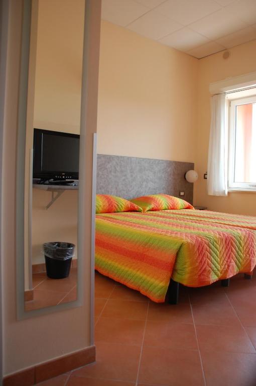 Postel nebo postele na pokoji v ubytování AutoHotel