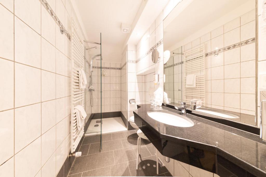 Koupelna v ubytování Koener Hotel & Spa