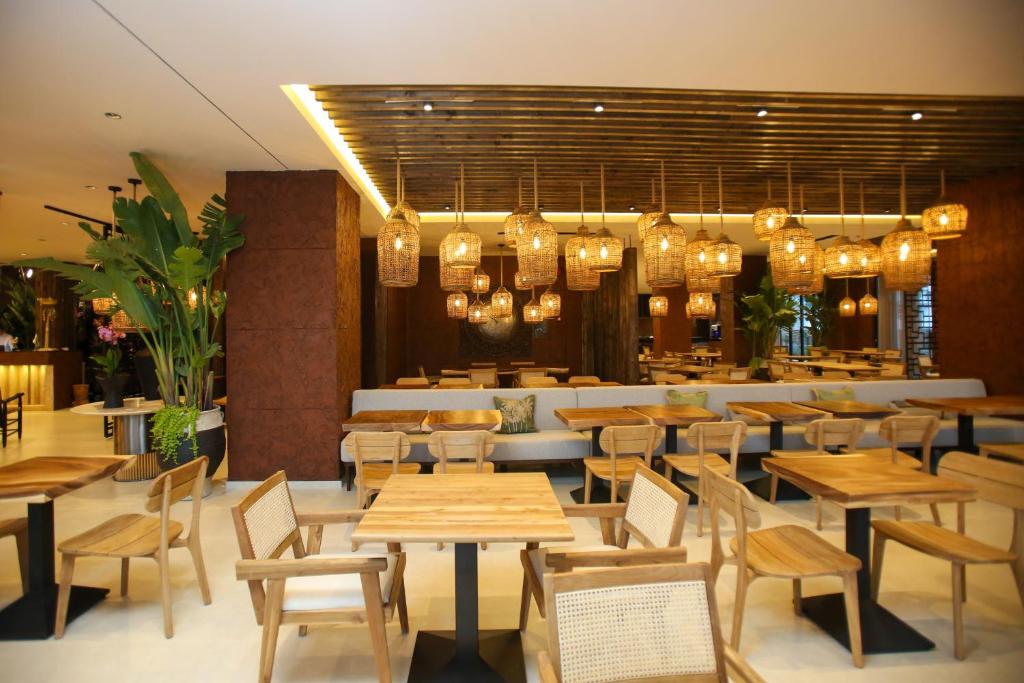 Restoran või mõni muu söögikoht majutusasutuses Regina Palm Resort