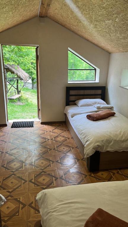 Postel nebo postele na pokoji v ubytování Lori O2