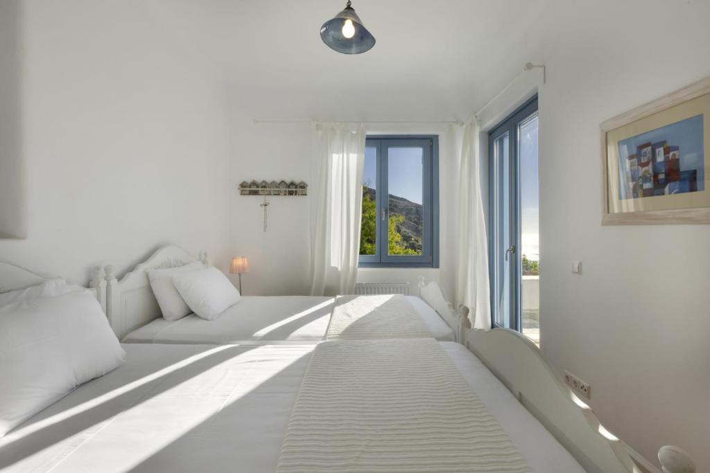 Posteľ alebo postele v izbe v ubytovaní Seaside luxury villa