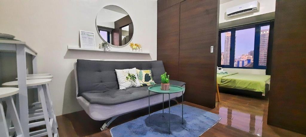 Кровать или кровати в номере Air Residences -City View