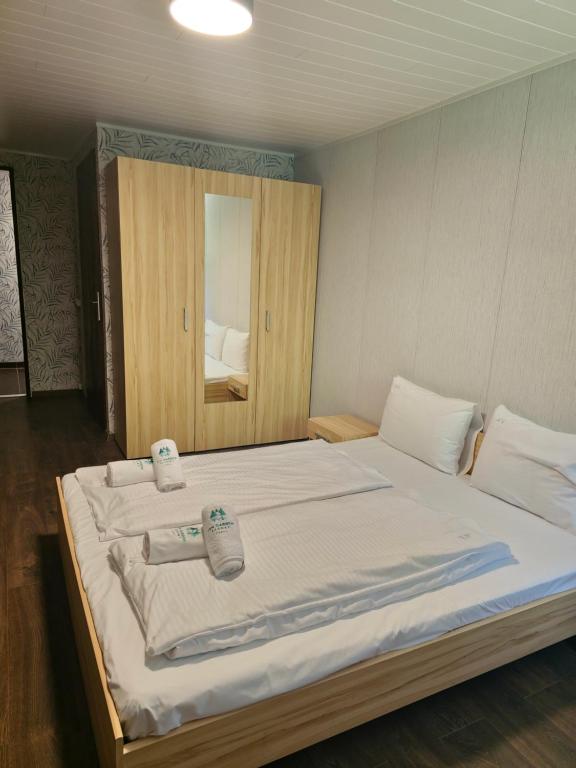 Postel nebo postele na pokoji v ubytování Zánka Vízparti Üdülő