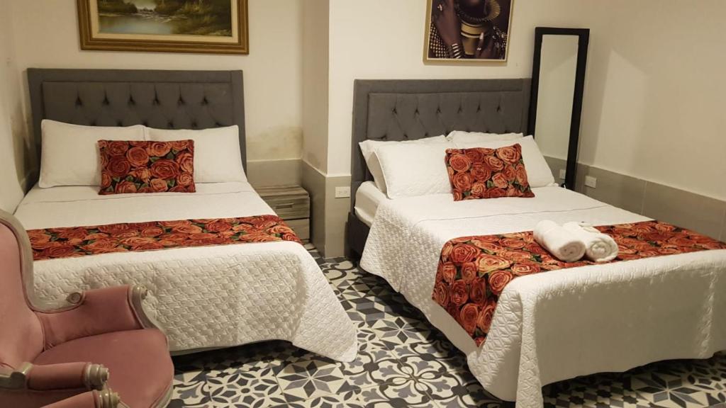 Postel nebo postele na pokoji v ubytování Hotel CastilloMar