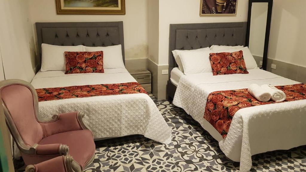 Postel nebo postele na pokoji v ubytování Hotel CastilloMar