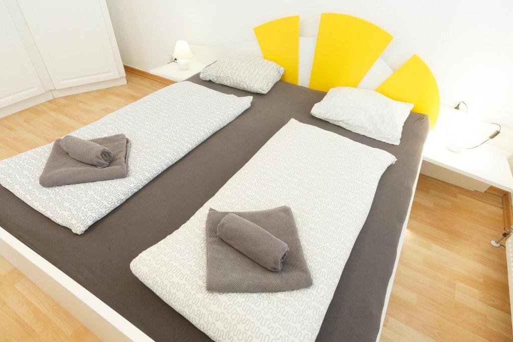Posteľ alebo postele v izbe v ubytovaní Apartments in Vienna near Schönbrunn & Westbahnhof - Keyless Check-In
