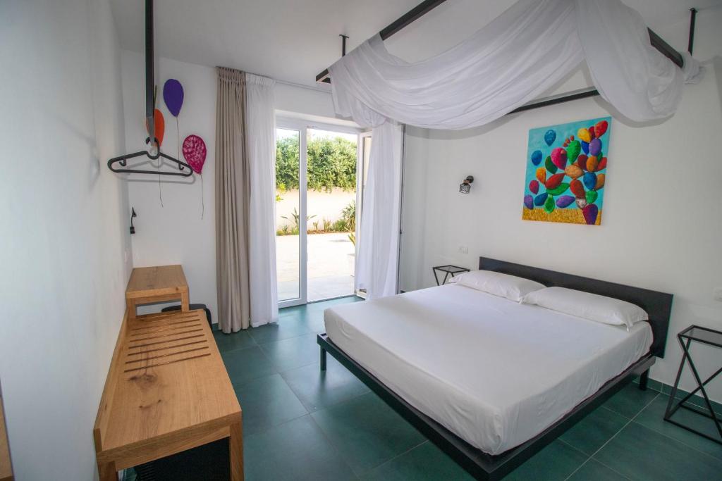 Postel nebo postele na pokoji v ubytování Hotel Arte Mare