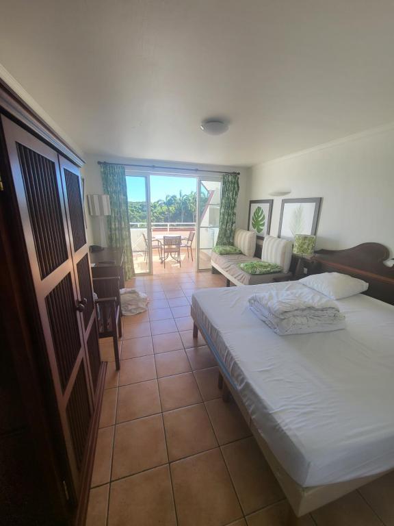 Postel nebo postele na pokoji v ubytování NEW ! Appartements avec piscine et plages accessibles à pieds