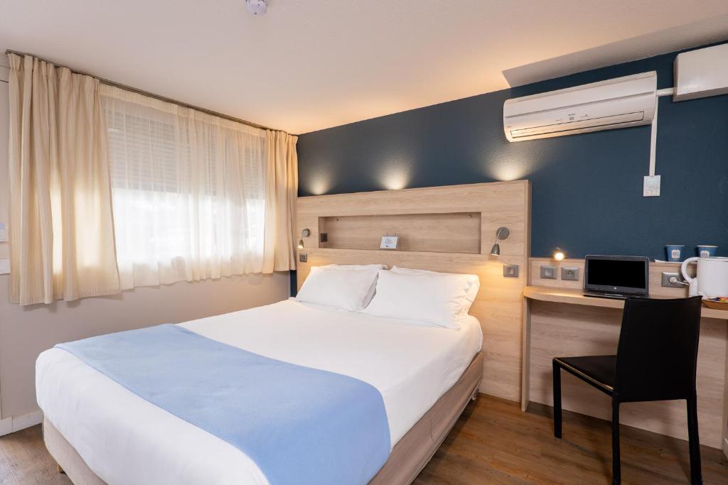 En eller flere senger på et rom på Kyriad Digne-Les-Bains