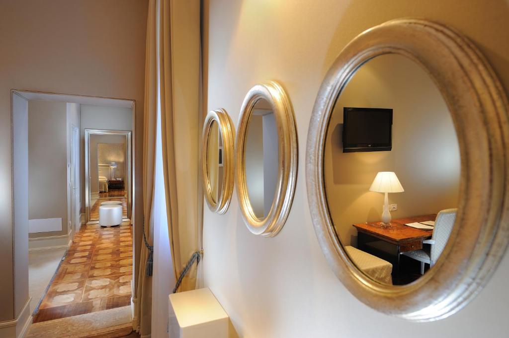 Postel nebo postele na pokoji v ubytování Hotel Ai Due Principi