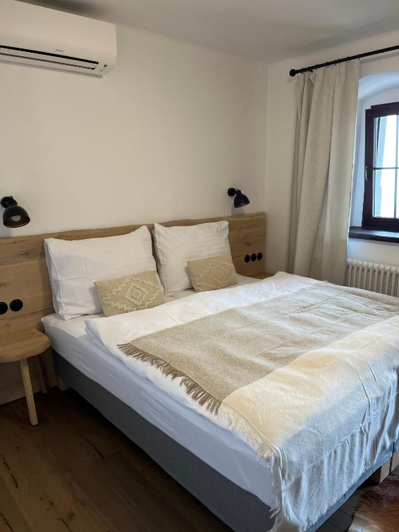 Postel nebo postele na pokoji v ubytování Penzion Kaplanka
