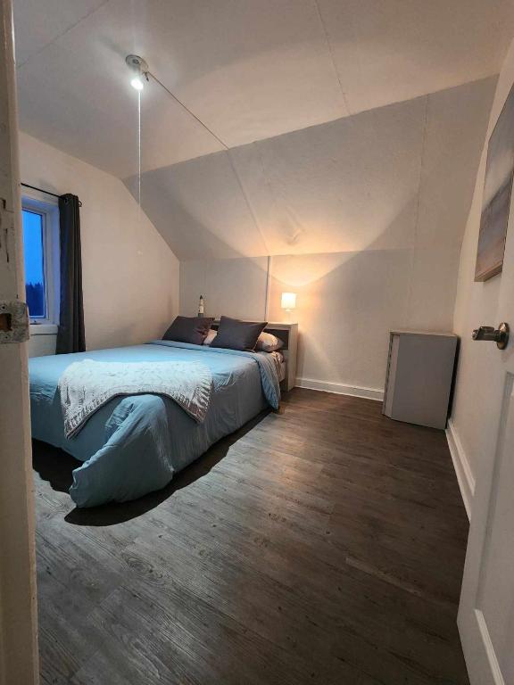 Postel nebo postele na pokoji v ubytování Oasis de la Baie