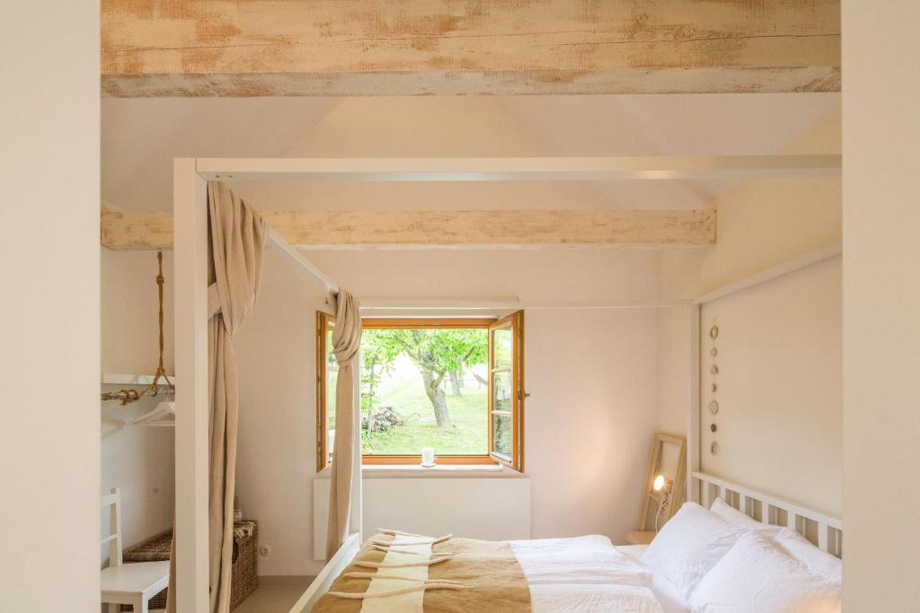 מיטה או מיטות בחדר ב-WEINLOFTS Weinloft I