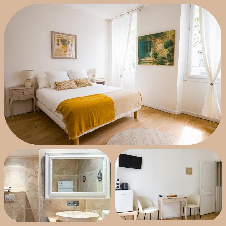 une chambre blanche avec un lit et une télévision dans l'établissement Les Chambres de RESEAU LOUISANNE, à Saint-Rémy-de-Provence