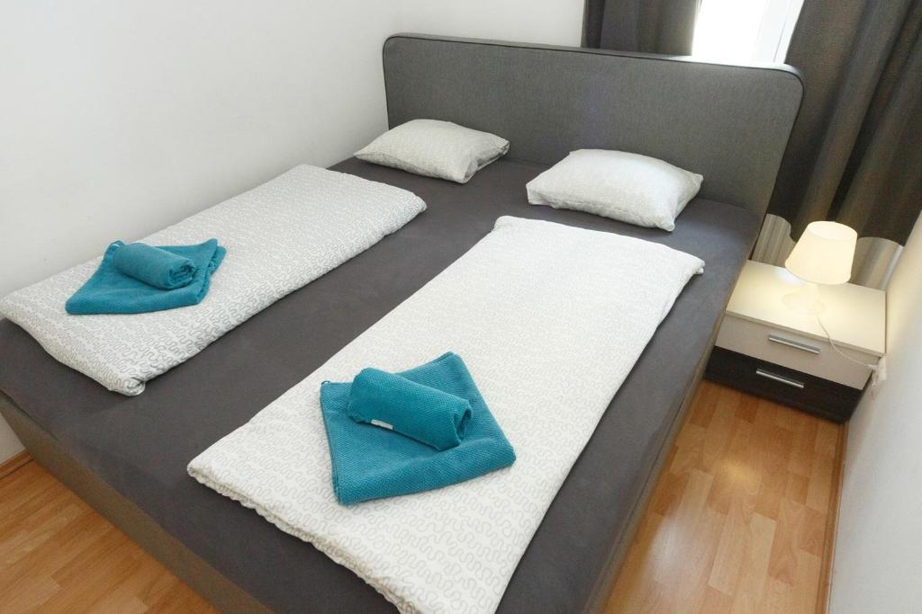 Posteľ alebo postele v izbe v ubytovaní Apartments in Vienna near Schönbrunn & Westbahnhof - Keyless Check-In